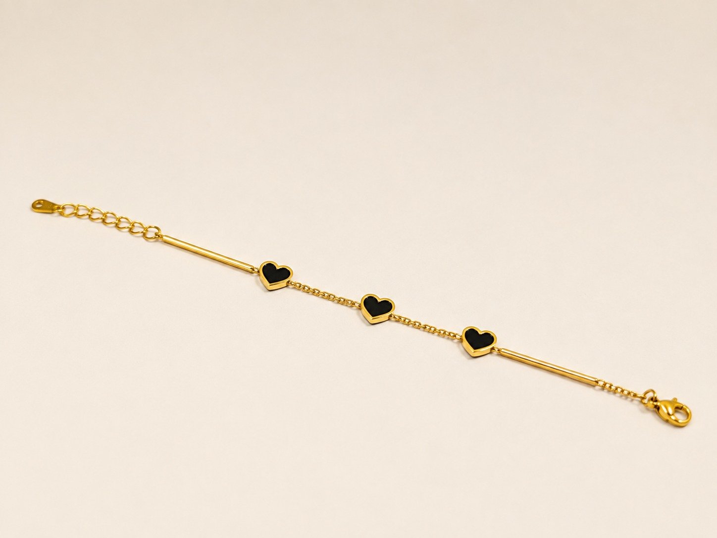 Elegant Gold & Black Heart Bracelet